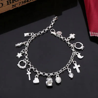 Armband Tilde (13 berlocker på kedja – charmarmband i silverfärg)