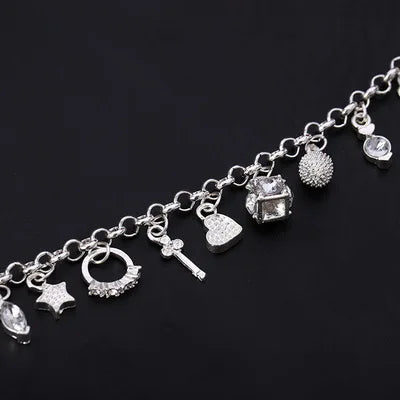 Armband Tilde (13 berlocker på kedja – charmarmband i silverfärg)