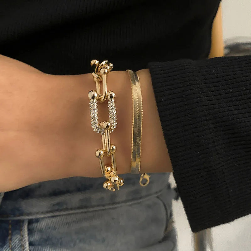 Armband Elvira (ormkedja i guldfärg – justerbar länkdesign)