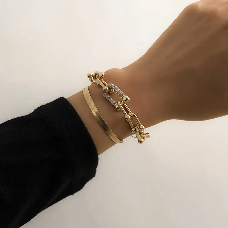 Armband Elvira (ormkedja i guldfärg – justerbar länkdesign)