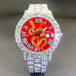 Klocka Johan (herrklocka i guldfärg med röd urtavla, strass & datum)