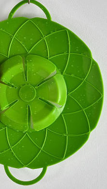 Silikoninen kansisuoja – estää ylikypsennyksen ja pölyn keittiössä