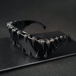 Unika solglasögon – hajtandsdesign & handgjorda detaljer