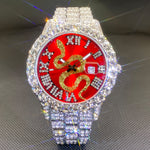 Klocka Johan (herrklocka i guldfärg med röd urtavla, strass & datum)