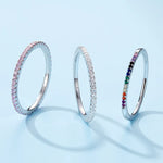 Ring Evelina (guldfärgad ring med gnistrande stenar – stapelbar)