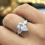 Droppformad ring med sten – 1–4 ct