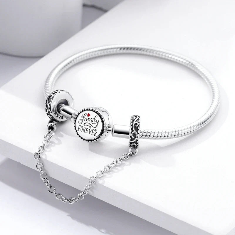 Berlocker Saga (säkerhetskedja & berlocker – flygplan, blomma & kamera)