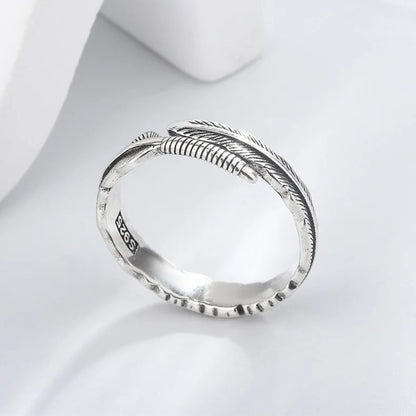 Ring Ronja (öppen ring med retro fjäderdesign)