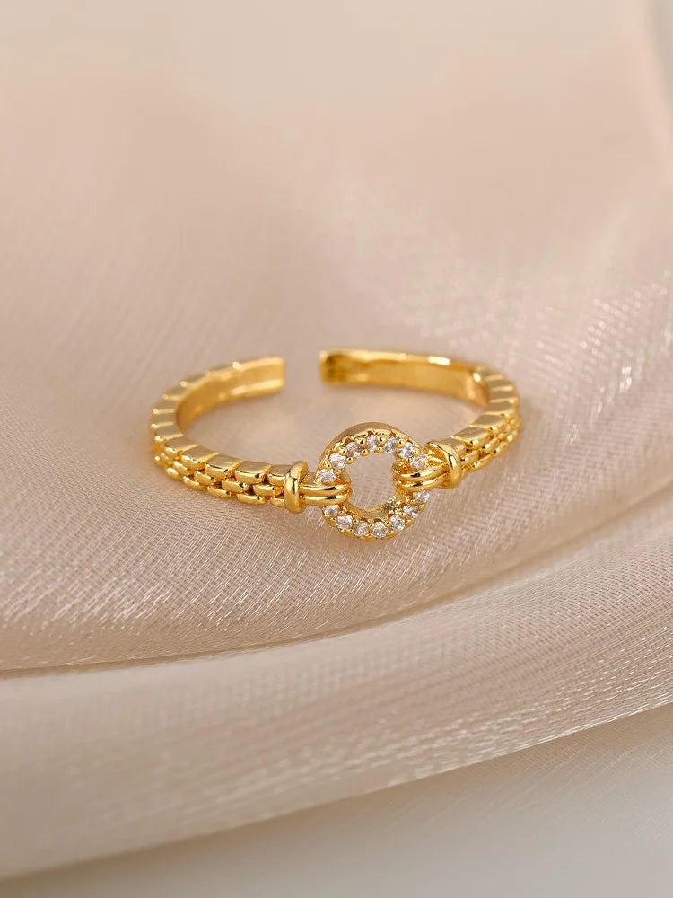 Tvistad ring dam – öppen ring i rostfritt stål med zirkon