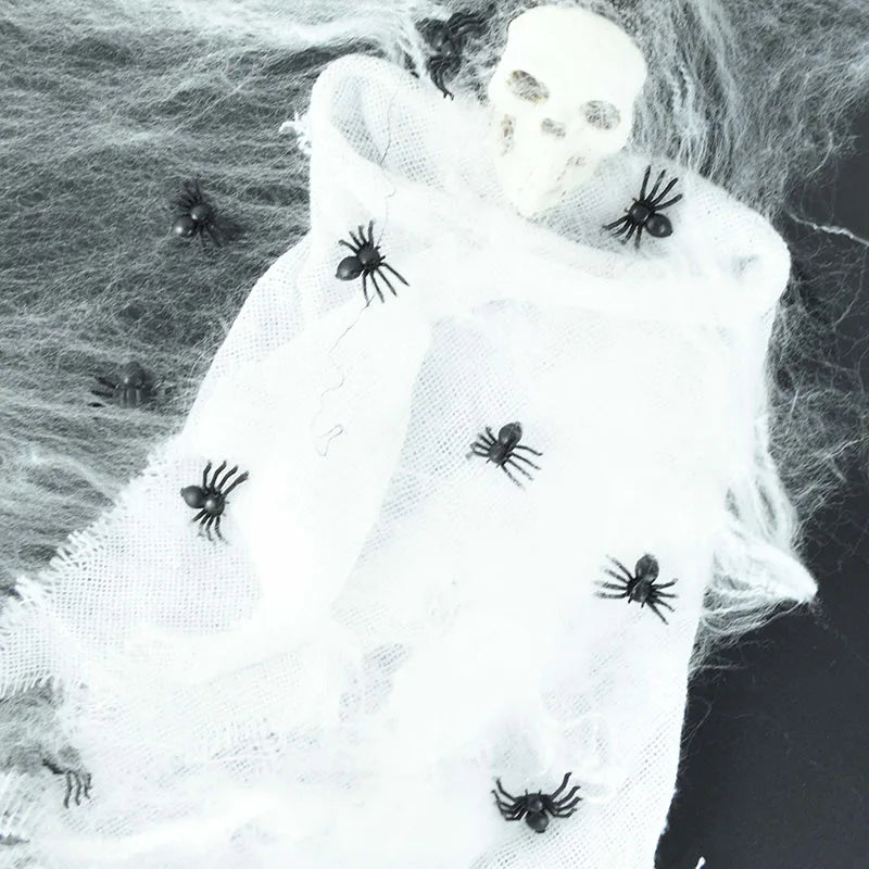 Lysande minispindlar halloween – 50 st självlysande dekorationer