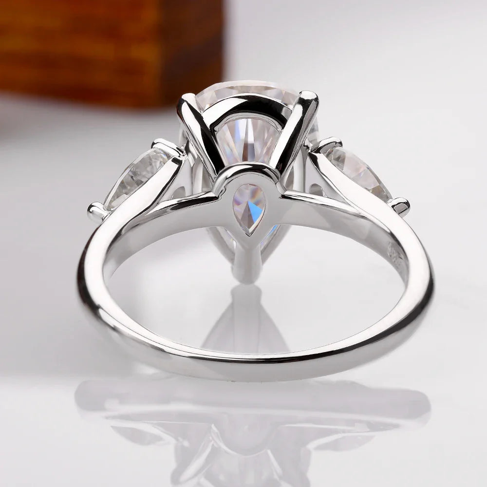 Droppformad ring med sten – 1–4 ct