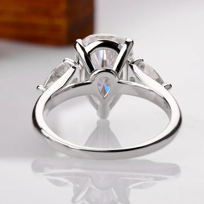 Droppformad ring med sten – 1–4 ct