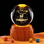 Krystallkule og nattbordslampe med solsystemtema 