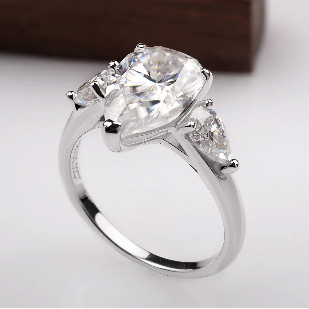 Droppformad ring med sten – 1–4 ct