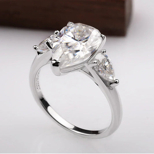 Droppformad ring med sten – 1–4 ct