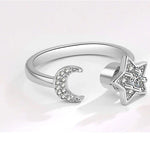 Stjärnring – snurrbar damring med mån- & stjärndetaljer