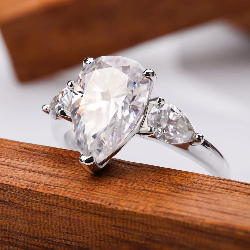 Droppformad ring med sten – 1–4 ct