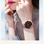 Klocka Stina (stjärnhimmel-design med magnetiskt spänne och meshband)