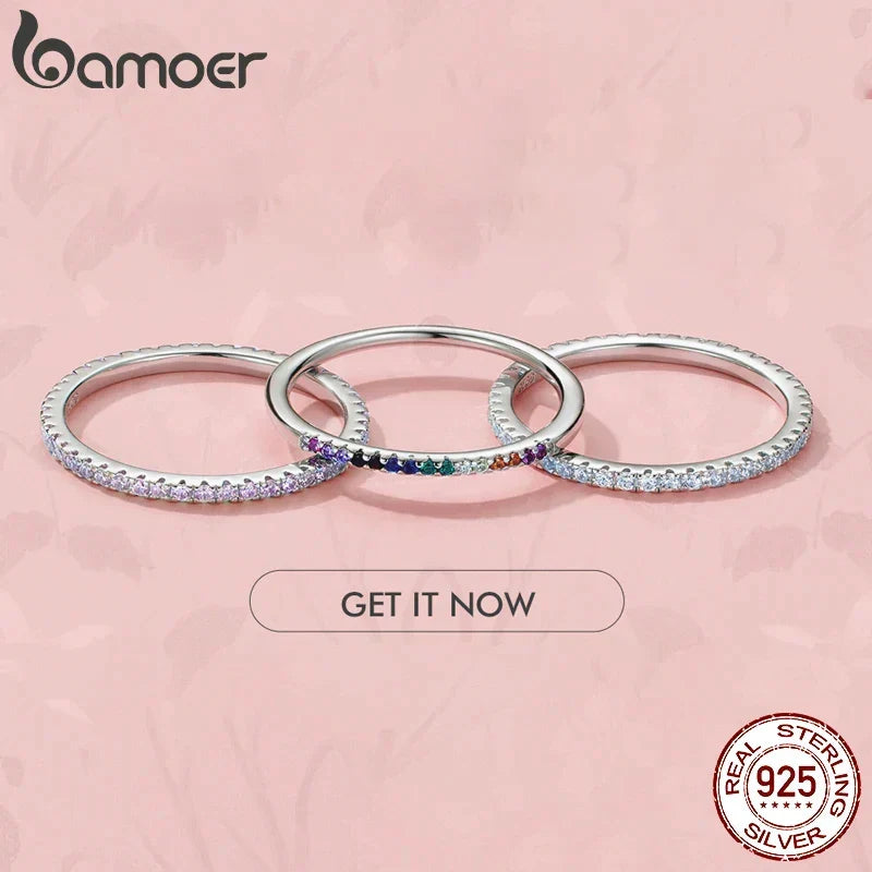 Ring Evelina (guldfärgad ring med gnistrande stenar – stapelbar)