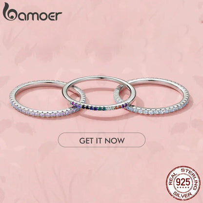 Ring Evelina (guldfärgad ring med gnistrande stenar – stapelbar)