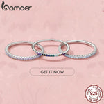 Ring Evelina (guldfärgad ring med gnistrande stenar – stapelbar)