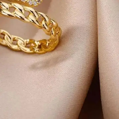 Tvistad ring dam – öppen ring i rostfritt stål med zirkon