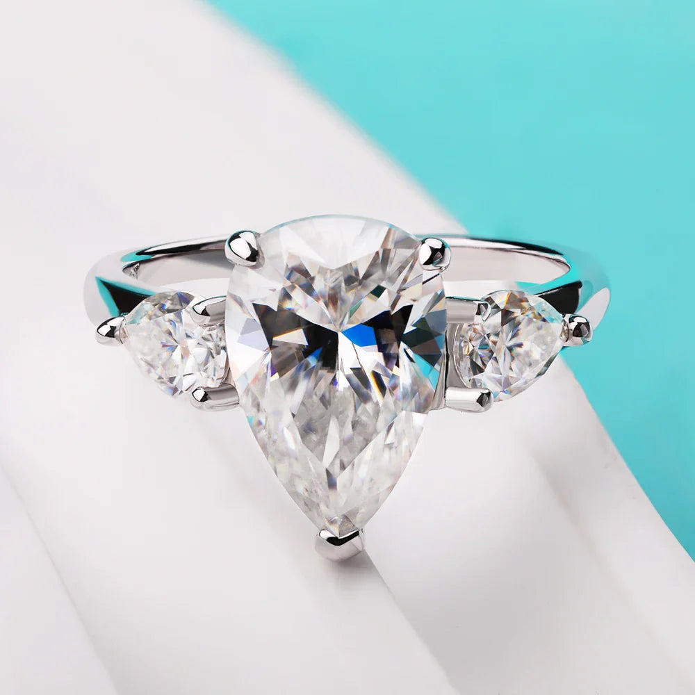 Droppformad ring med sten – 1–4 ct