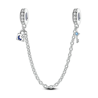 Berlocker Saga (säkerhetskedja & berlocker – flygplan, blomma & kamera)