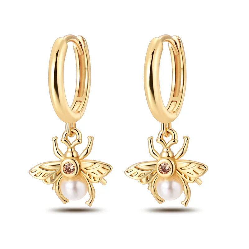 Eleganta örhängen – hoops med stjärnor, månar & pärlor