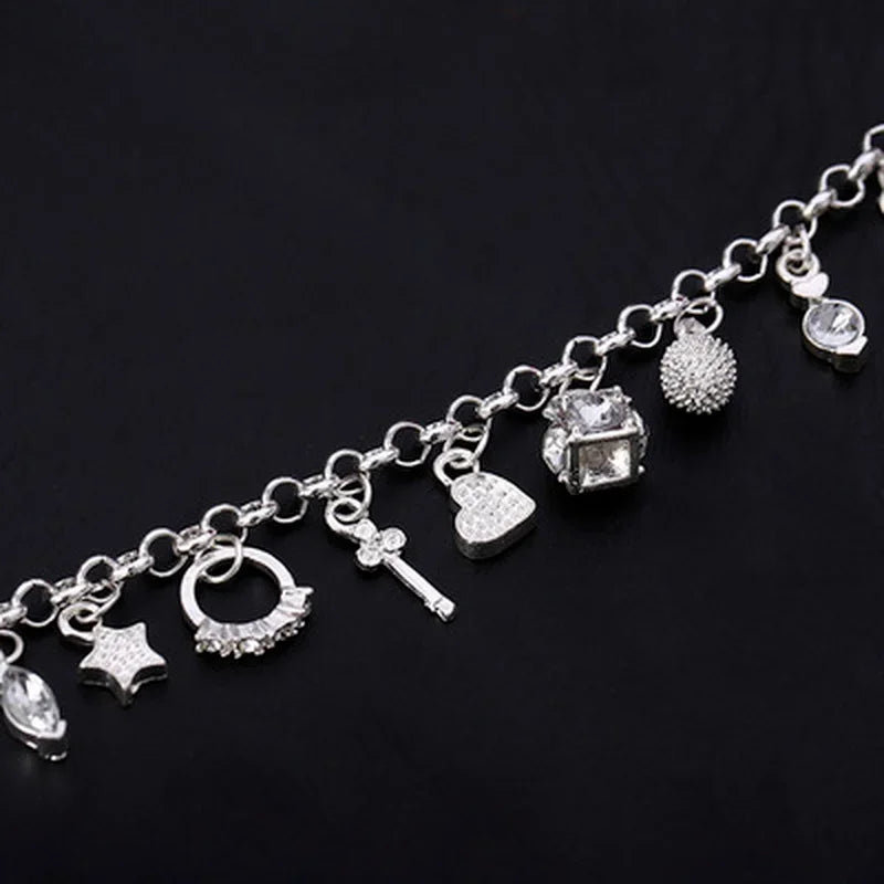 Armband Tilde (13 berlocker på kedja – charmarmband i silverfärg)