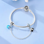 Berlocker Saga (säkerhetskedja & berlocker – flygplan, blomma & kamera)