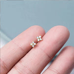 Armband Linn (fyrklöver-armband i guldfärg med zirkoner)