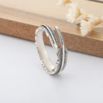 Ring Ronja (öppen ring med retro fjäderdesign)