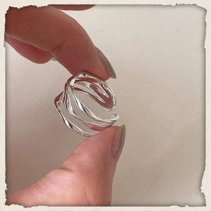 Ring Alma (justerbar ring i geometrisk flerlagersdesign)