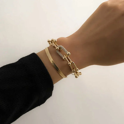 Armband Elvira (ormkedja i guldfärg – justerbar länkdesign)