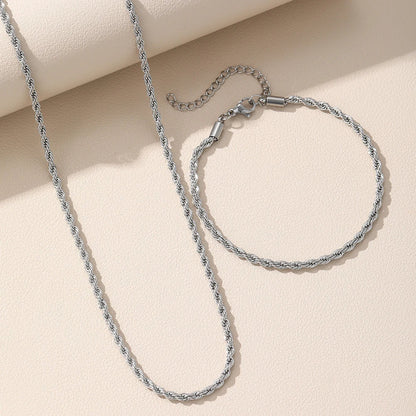 Halsband & armband i silverfärg – tvinnad kedja