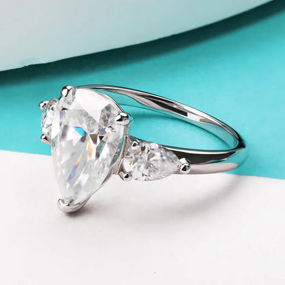 Droppformad ring med sten – 1–4 ct