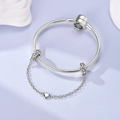 Berlocker Saga (säkerhetskedja & berlocker – flygplan, blomma & kamera)