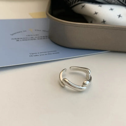 Ring Sanna (handgjord ring med oregelbundna vattendroppar & korsdesign)
