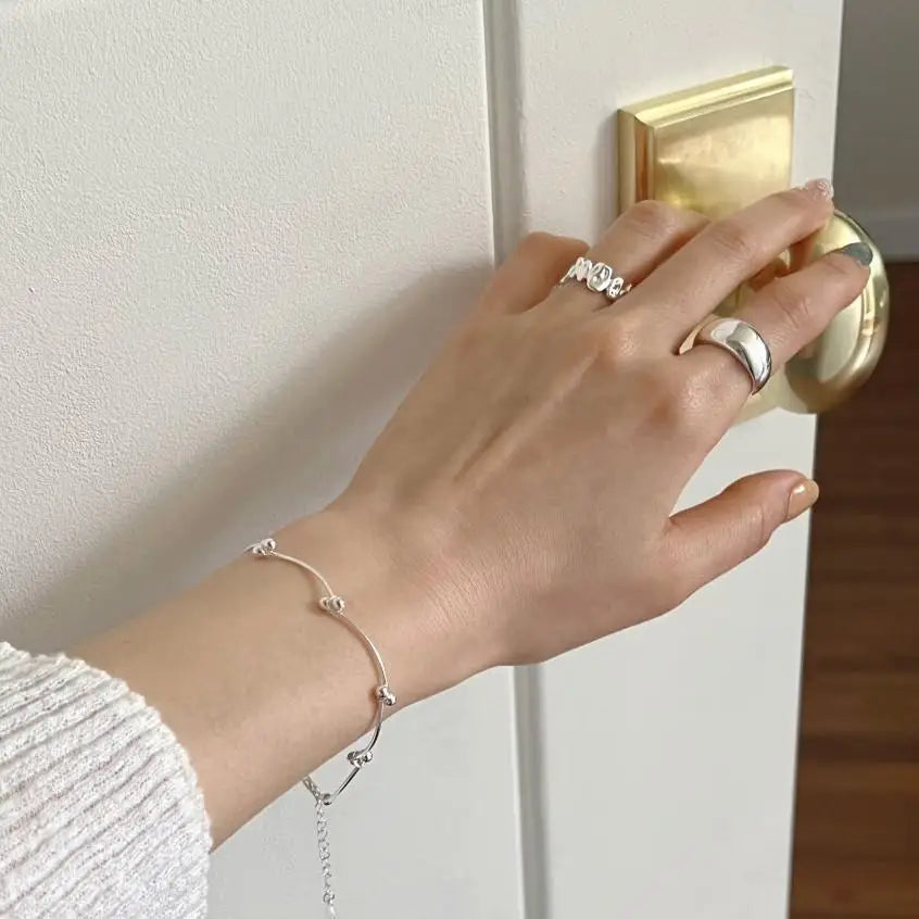 Ring Liv (öppen oregelbunden ring i silverfärg – justerbar design)