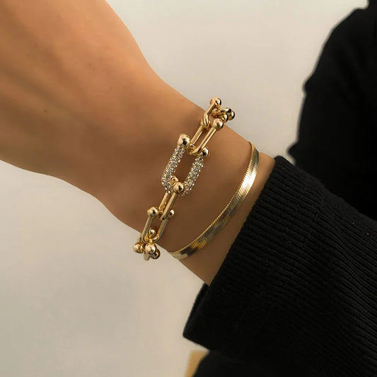 Armband Elvira (ormkedja i guldfärg – justerbar länkdesign)