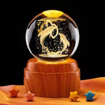 Krystallkule og nattbordslampe med solsystemtema 