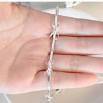 Armband Elise (enkelt armband med rosett & geometrisk design)