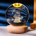 Krystallkule og nattbordslampe med solsystemtema 