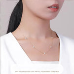 Armband Linn (fyrklöver-armband i guldfärg med zirkoner)