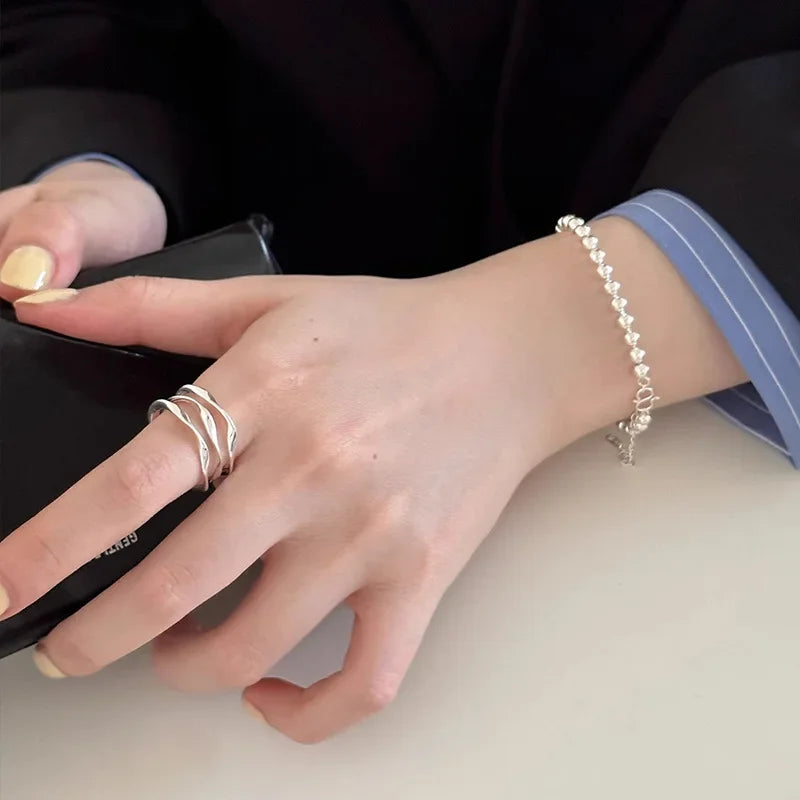 Ring Alma (justerbar ring i geometrisk flerlagersdesign)