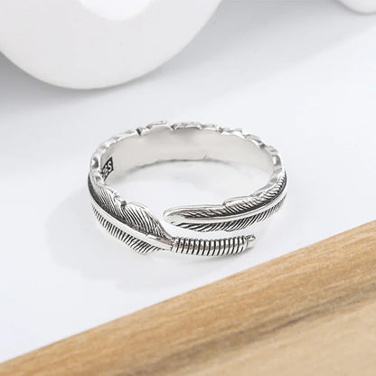 Ring Ronja (öppen ring med retro fjäderdesign)