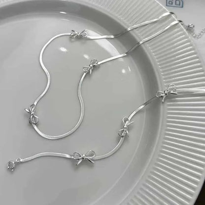 Armband Elise (enkelt armband med rosett & geometrisk design)