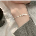 Armband Elise (enkelt armband med rosett & geometrisk design)