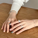 Ring Liv (öppen oregelbunden ring i silverfärg – justerbar design)